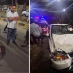 A drunk Russian woman involved in a car crash on VIP Road, Raipur, standing beside a damaged vehicle with bystanders in the background